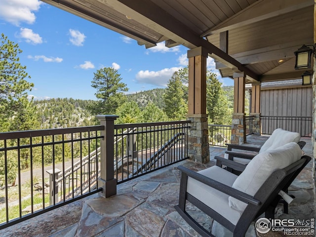 3411 Hillcrest Ln, Estes Park, CO 80517 - balcony featuring a view of trees