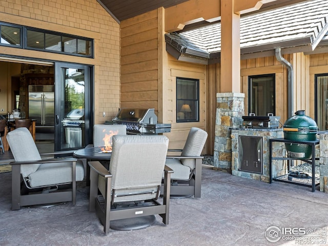 3411 Hillcrest Ln, Estes Park, CO 80517 - view of patio / terrace with an outdoor kitchen