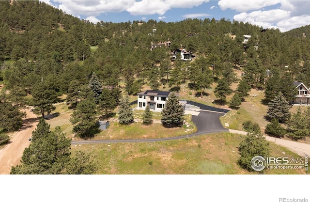 514 Granite Dr, Boulder, CO 80302 - aerial view of property and surrounding area featuring a heavily wooded area