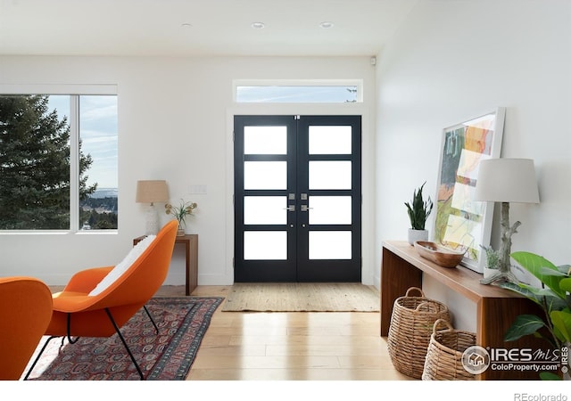 514 Granite Dr, Boulder, CO 80302 - entryway with french doors and wood finished floors