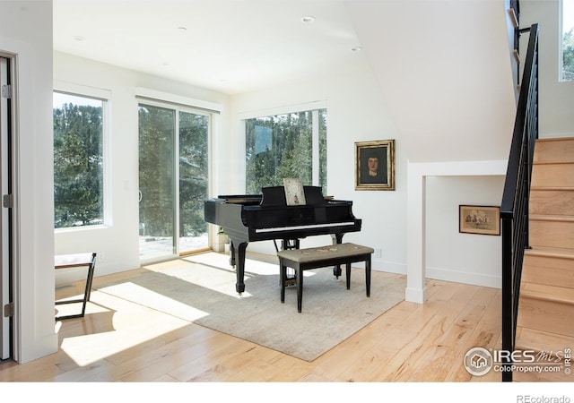 514 Granite Dr, Boulder, CO 80302 - living area with light wood finished floors, stairs, and recessed lighting