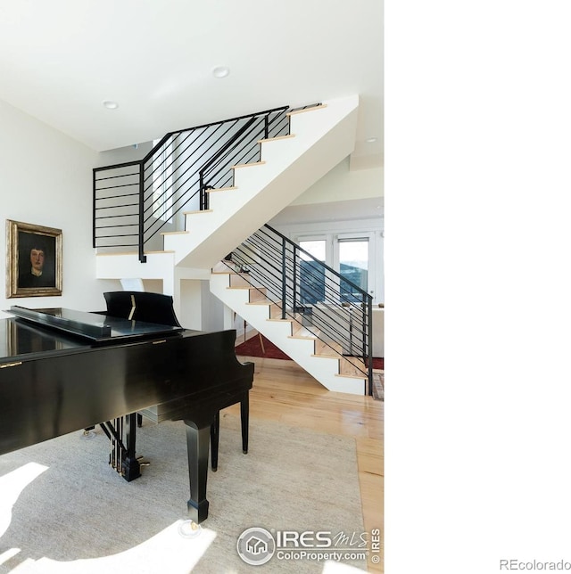 514 Granite Dr, Boulder, CO 80302 - stairway with wood finished floors and recessed lighting
