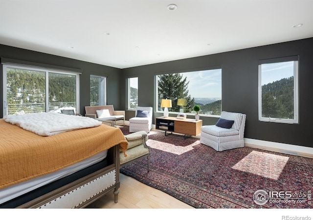 514 Granite Dr, Boulder, CO 80302 - bedroom with wood finished floors and recessed lighting