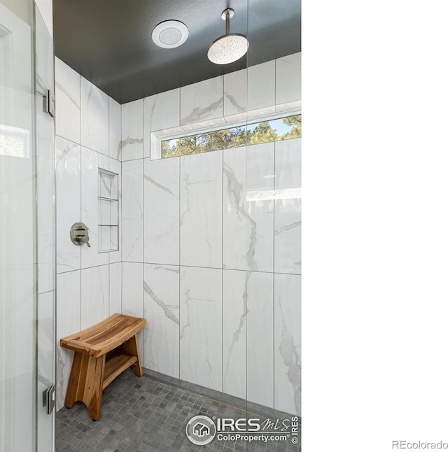 514 Granite Dr, Boulder, CO 80302 - bathroom with a tile shower and tile patterned flooring