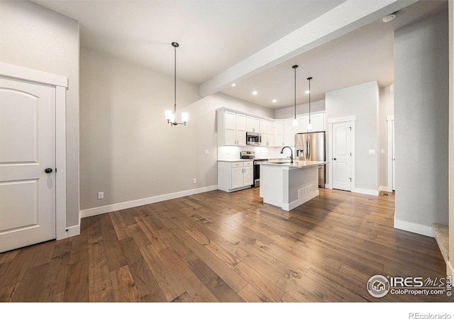 2470 Trio Falls Dr, Loveland, CO 80538 - kitchen featuring stainless steel appliances, dark wood-style floors, backsplash, recessed lighting, and light countertops