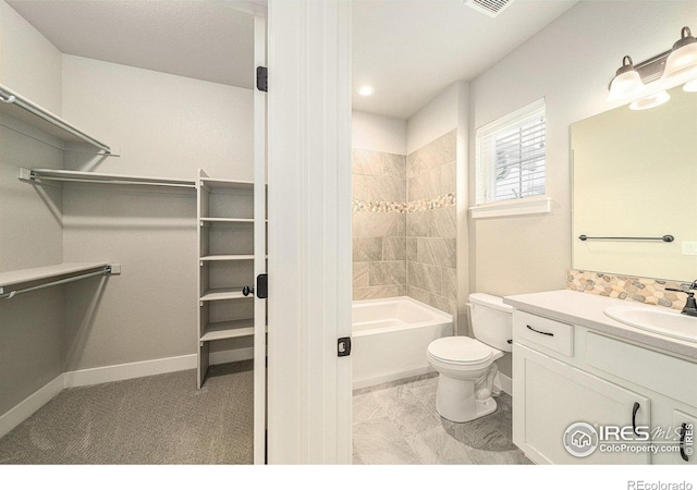 2470 Trio Falls Dr, Loveland, CO 80538 - full bath featuring vanity,  shower combination, a spacious closet, and marble finish floors