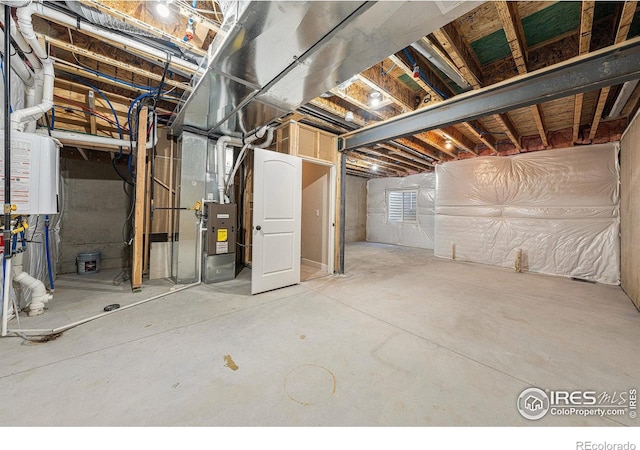 2470 Trio Falls Dr, Loveland, CO 80538 - unfinished basement featuring heating unit