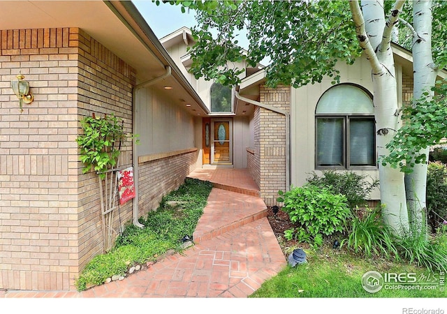 1357 43rd Ave Unit 60, Greeley, CO 80634 - view of exterior entry with brick siding