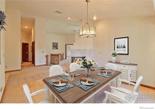 1357 43rd Ave Unit 60, Greeley, CO 80634 - dining area with a chandelier, light tile patterned floors, and recessed lighting