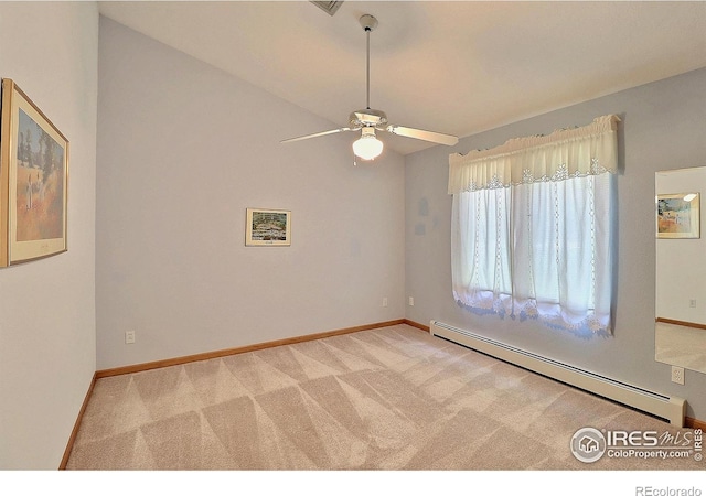 1357 43rd Ave Unit 60, Greeley, CO 80634 - carpeted empty room with a baseboard heating unit, a ceiling fan, and lofted ceiling