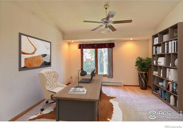 1357 43rd Ave Unit 60, Greeley, CO 80634 - carpeted home office featuring a baseboard radiator, ceiling fan, and vaulted ceiling