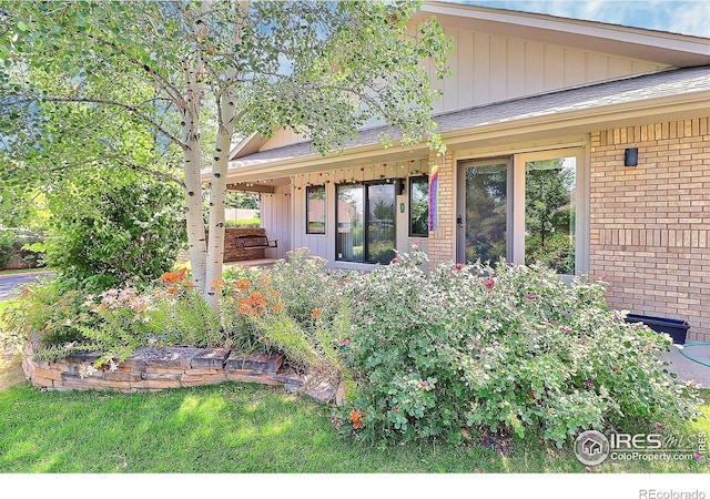 1357 43rd Ave Unit 60, Greeley, CO 80634 - entrance to property featuring brick siding