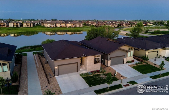 2772 Vallecito St, Timnath, CO 80547 - aerial perspective of suburban area featuring a large body of water