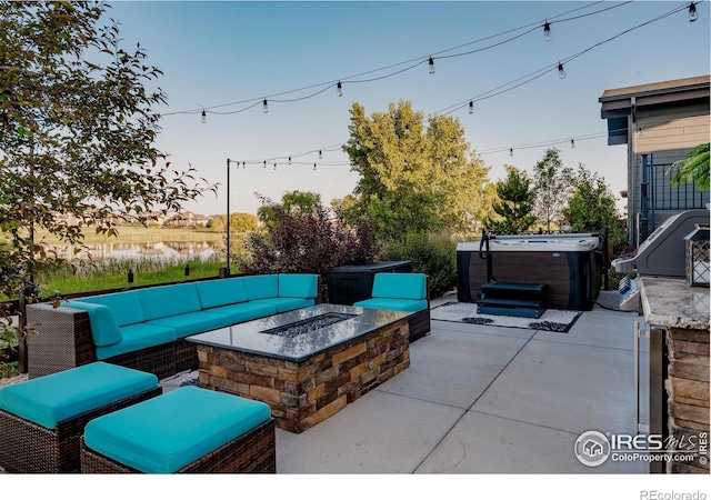 2772 Vallecito St, Timnath, CO 80547 - view of patio / terrace featuring a hot tub and an outdoor living space with a fire pit