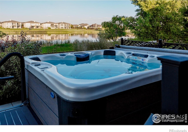 2772 Vallecito St, Timnath, CO 80547 - view of pool featuring a hot tub, a water view, and a residential view