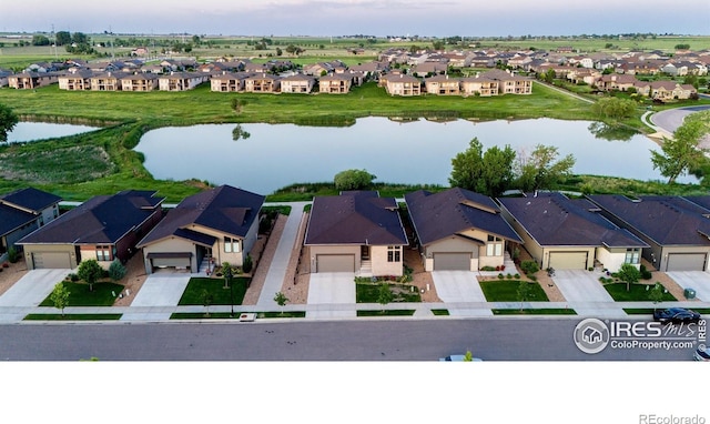 2772 Vallecito St, Timnath, CO 80547 - aerial view of residential area featuring a large body of water