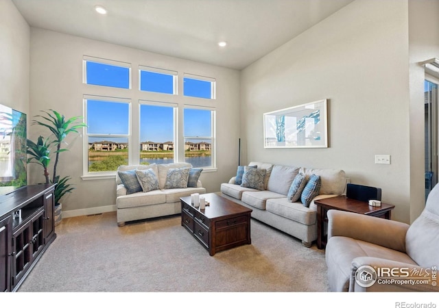2772 Vallecito St, Timnath, CO 80547 - living room with carpet floors and recessed lighting