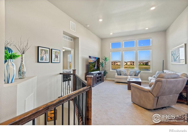 2772 Vallecito St, Timnath, CO 80547 - carpeted living area featuring recessed lighting