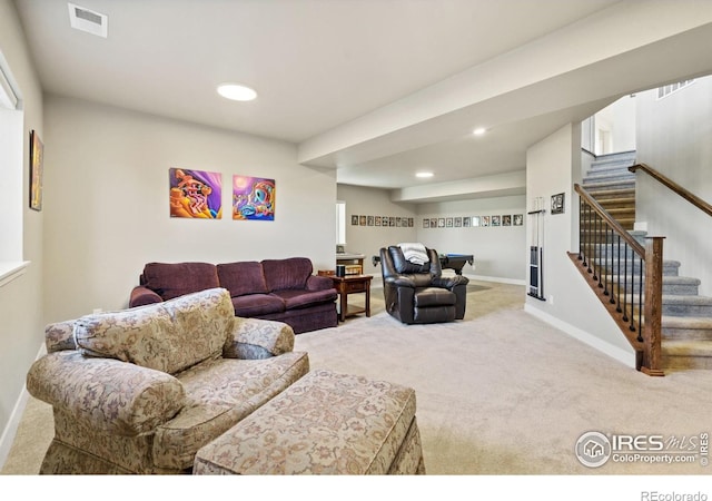 2772 Vallecito St, Timnath, CO 80547 - carpeted living area with stairs and recessed lighting