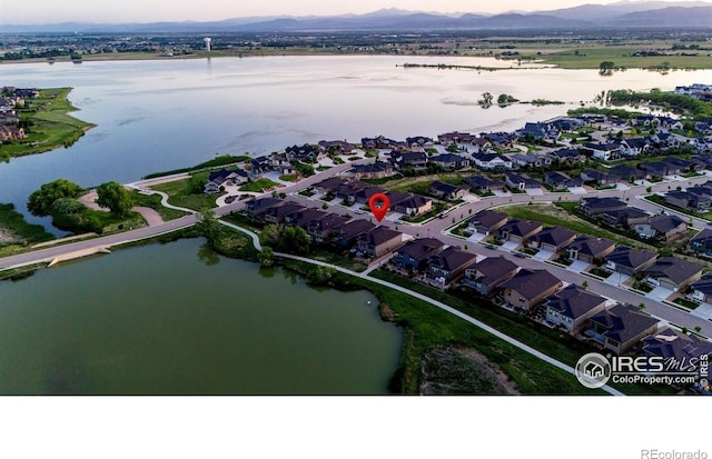 2772 Vallecito St, Timnath, CO 80547 - view of property location featuring a water and mountain view and nearby suburban area