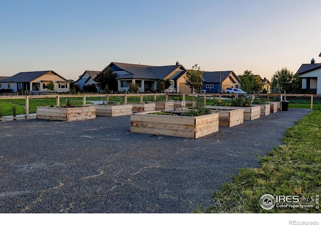 2772 Vallecito St, Timnath, CO 80547 - view of front of home with a garden and a residential view