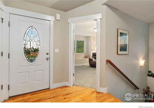 83 Evans St, Severance, CO 80550 - foyer entrance featuring light wood finished floors and baseboards
