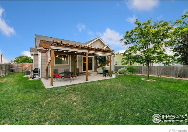 83 Evans St, Severance, CO 80550 - rear view of property featuring a pergola, a fenced backyard, and a patio
