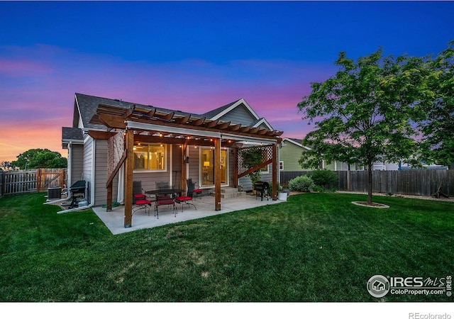 83 Evans St, Severance, CO 80550 - rear view of house featuring a pergola, a fenced backyard, and a patio