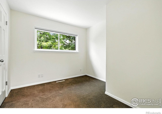 770 Quince Cir, Boulder, CO 80304 - unfurnished bedroom with dark colored carpet