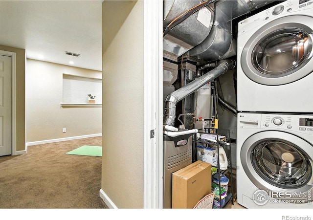 770 Quince Cir, Boulder, CO 80304 - laundry room featuring stacked washer / drying machine and carpet flooring