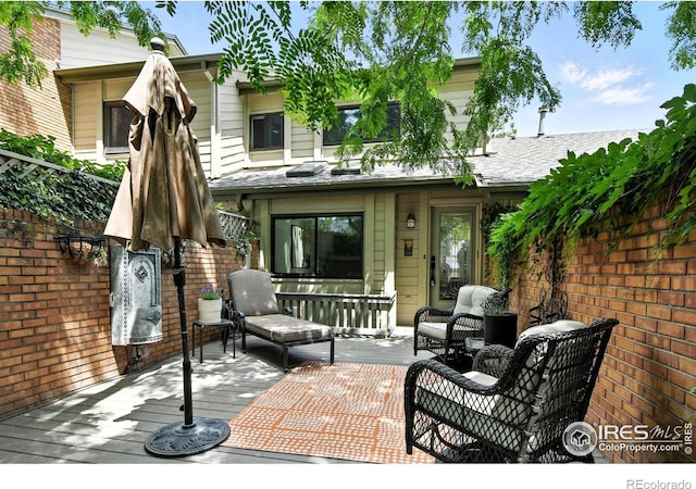 770 Quince Cir, Boulder, CO 80304 - rear view of property with outdoor lounge area and a wooden deck