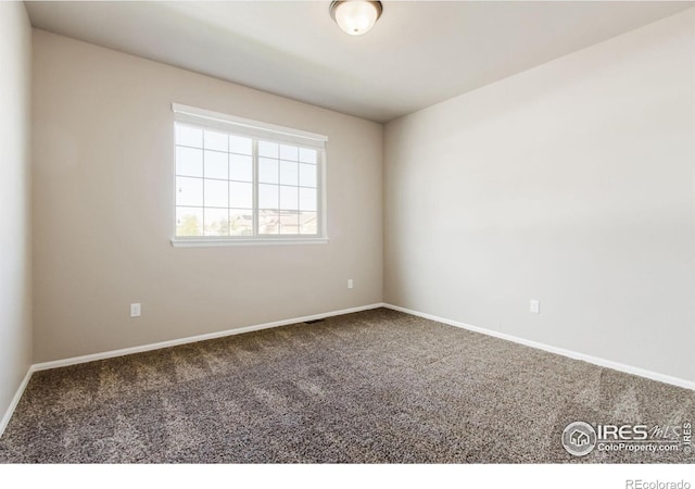 10400 17th St, Greeley, CO 80634 - spare room featuring carpet and baseboards