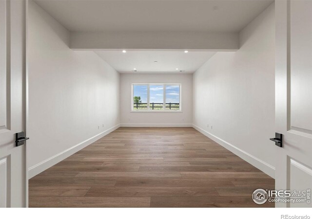 2568 Southwind Rd, Berthoud, CO 80513 - spare room featuring wood finished floors and recessed lighting