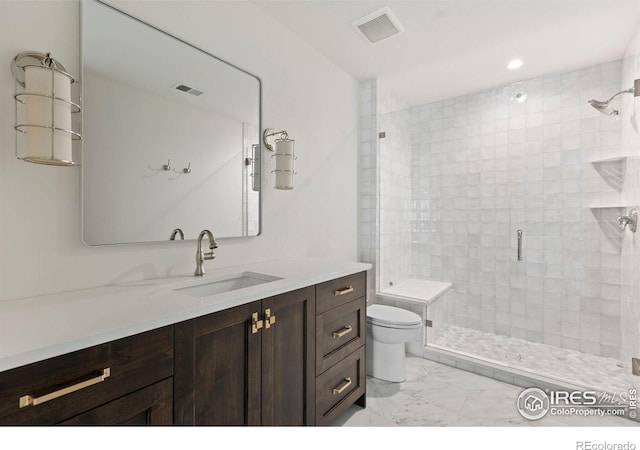 2568 Southwind Rd, Berthoud, CO 80513 - bathroom featuring marble finish flooring, a stall shower, vanity, and recessed lighting