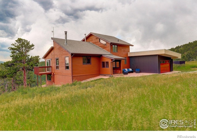 144 Coyote Ct, Boulder, CO 80302 - back of property with a garage