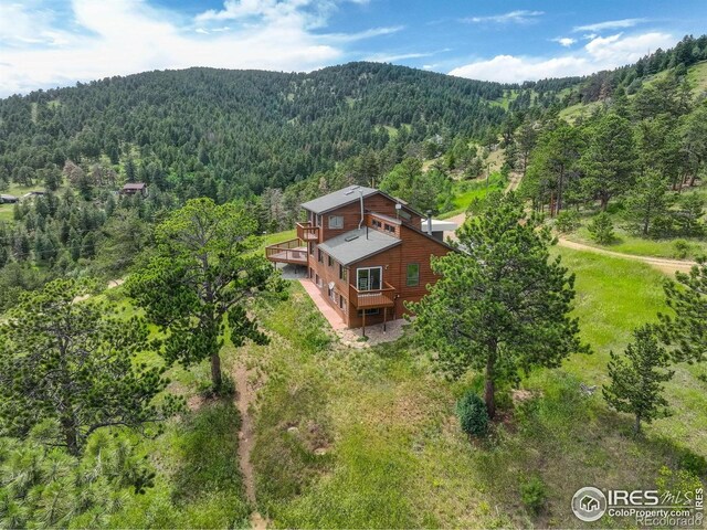 144 Coyote Ct, Boulder, CO 80302 - view from above of property featuring a forest and a mountainous background