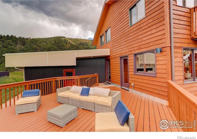 144 Coyote Ct, Boulder, CO 80302 - wooden deck with outdoor lounge area