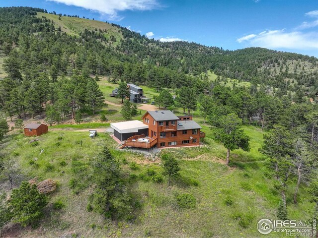 144 Coyote Ct, Boulder, CO 80302 - aerial view of property and surrounding area featuring mountains