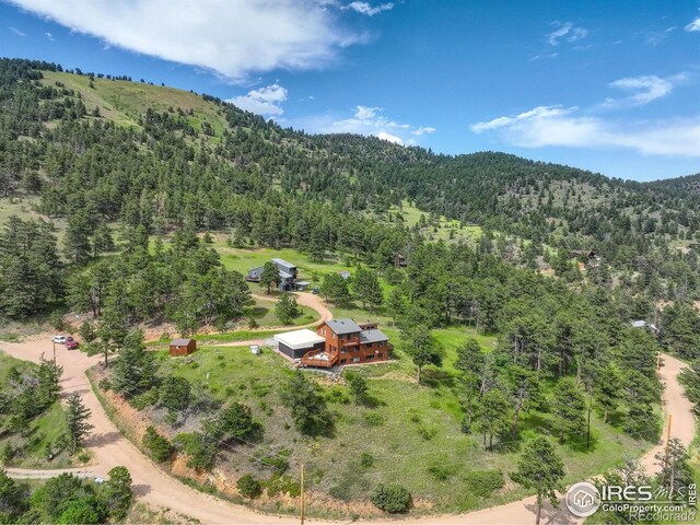 144 Coyote Ct, Boulder, CO 80302 - view of mountain backdrop featuring a forest