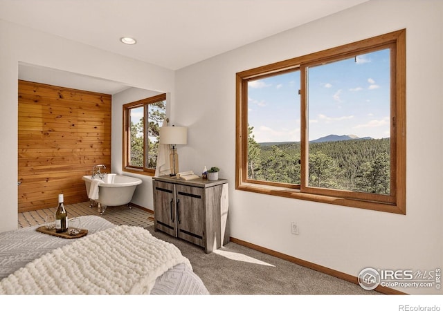 144 Coyote Ct, Boulder, CO 80302 - bedroom with wood walls, a mountain view, recessed lighting, and carpet