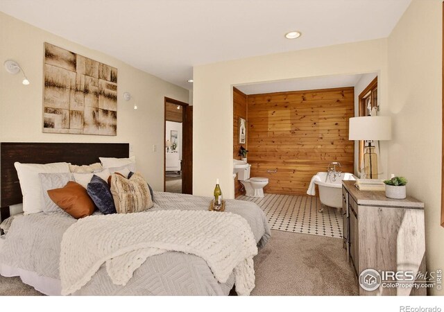 144 Coyote Ct, Boulder, CO 80302 - bedroom featuring wood walls, carpet flooring, ensuite bath, and recessed lighting