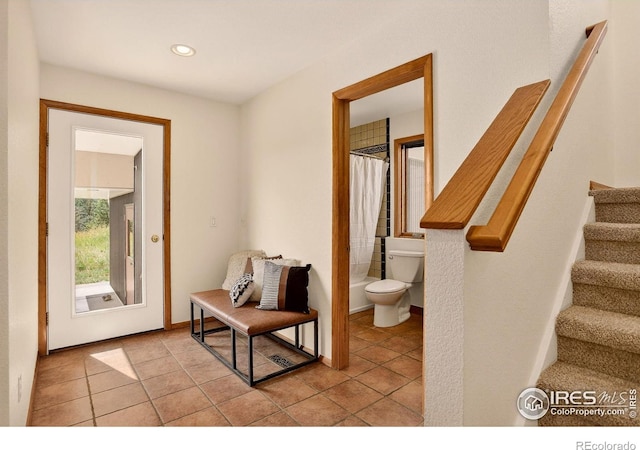 144 Coyote Ct, Boulder, CO 80302 - entryway featuring light tile patterned floors, stairs, and recessed lighting