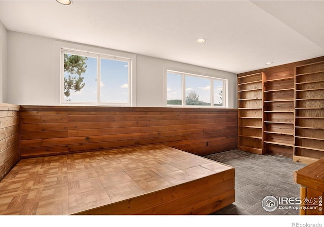 144 Coyote Ct, Boulder, CO 80302 - unfurnished room with wood walls, recessed lighting, and wainscoting