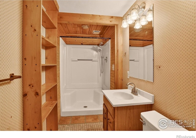 144 Coyote Ct, Boulder, CO 80302 - bathroom with wallpapered walls, a stall shower, vanity, tile patterned floors, and wood ceiling