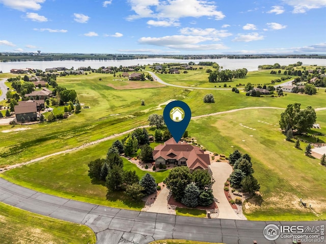 37044 Soaring Eagle Cir, Severance, CO 80550 - drone / aerial view of a nearby body of water and a local golf course