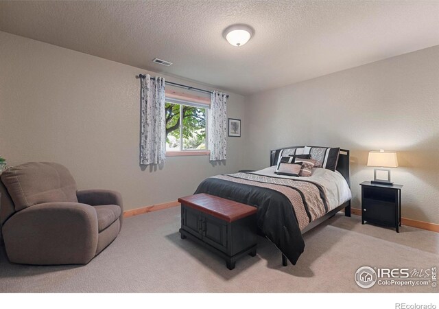 37044 Soaring Eagle Cir, Severance, CO 80550 - carpeted bedroom featuring baseboards and a textured ceiling