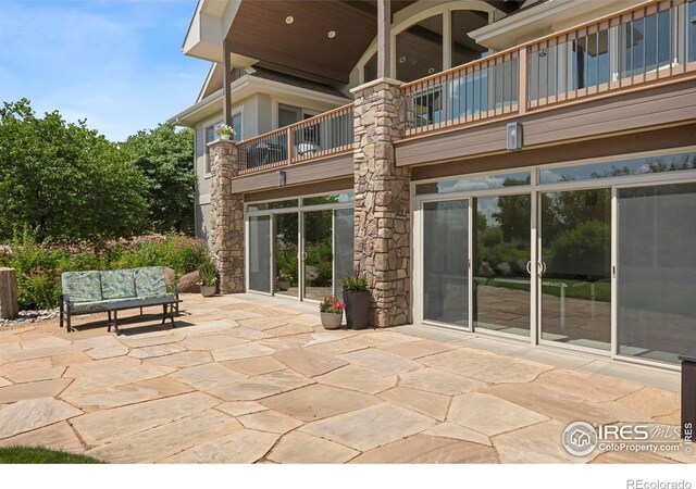 37044 Soaring Eagle Cir, Severance, CO 80550 - patio / terrace featuring a patio and an outdoor hangout area