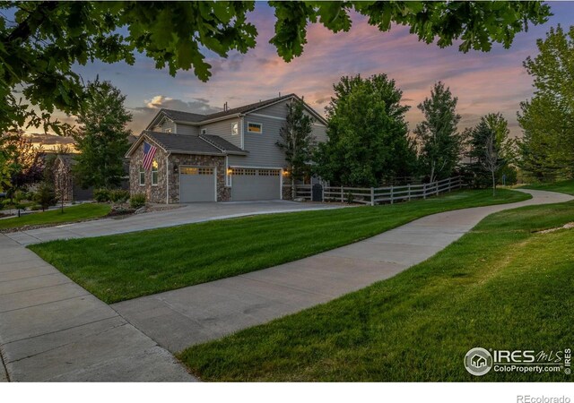 3290 Discovery Ct, Broomfield, CO 80023 - view of front facade with stone siding and driveway