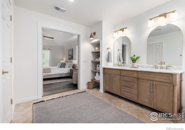 3290 Discovery Ct, Broomfield, CO 80023 - bathroom with ensuite bathroom, double vanity, and ceiling fan