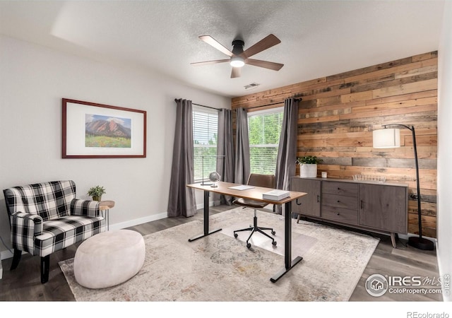 3290 Discovery Ct, Broomfield, CO 80023 - office with a ceiling fan, wooden walls, wood finished floors, and a textured ceiling